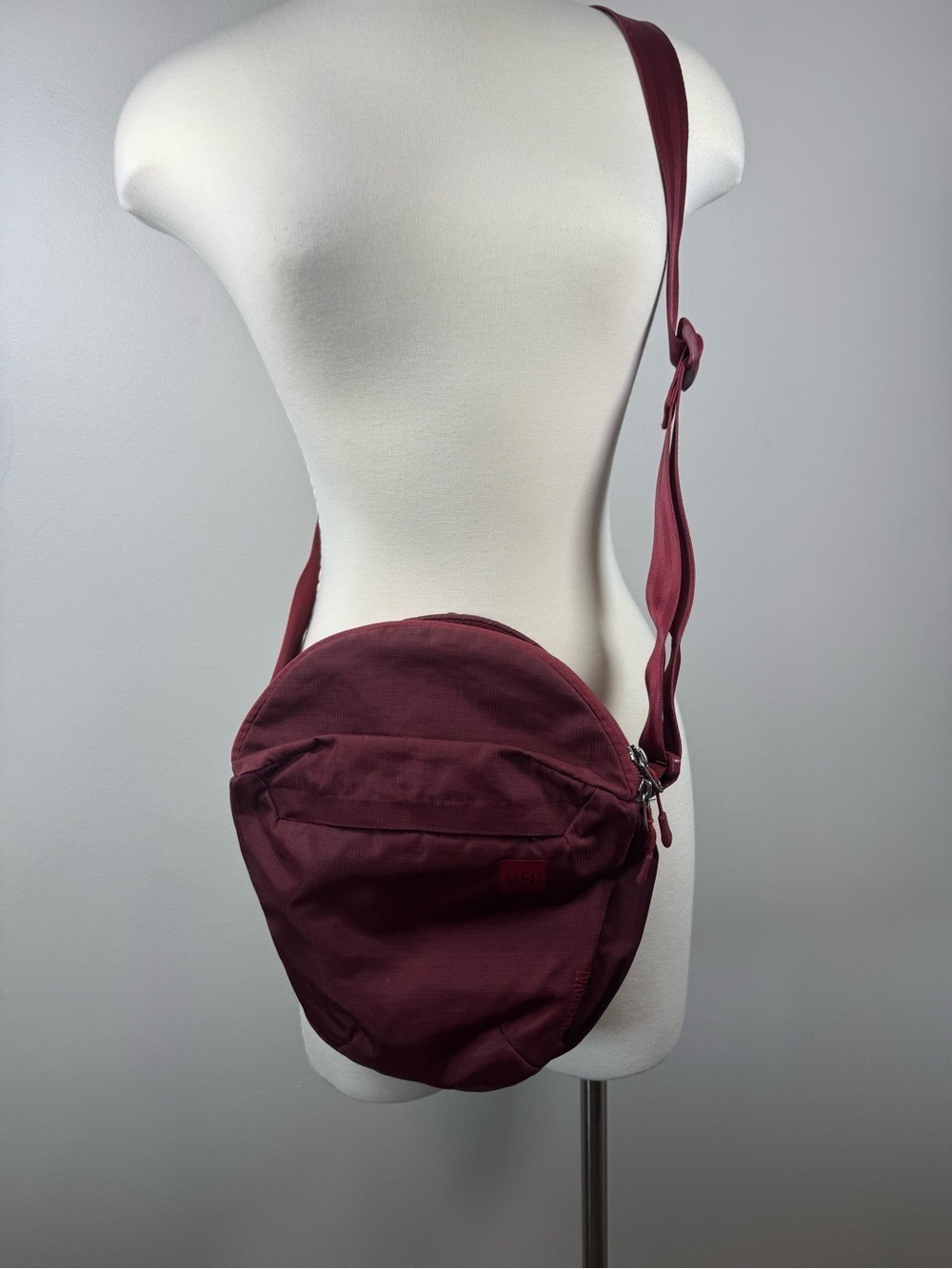 Circular Burgundy Crossbody Bag with Front Zip Pocket - Picture 1 of 8